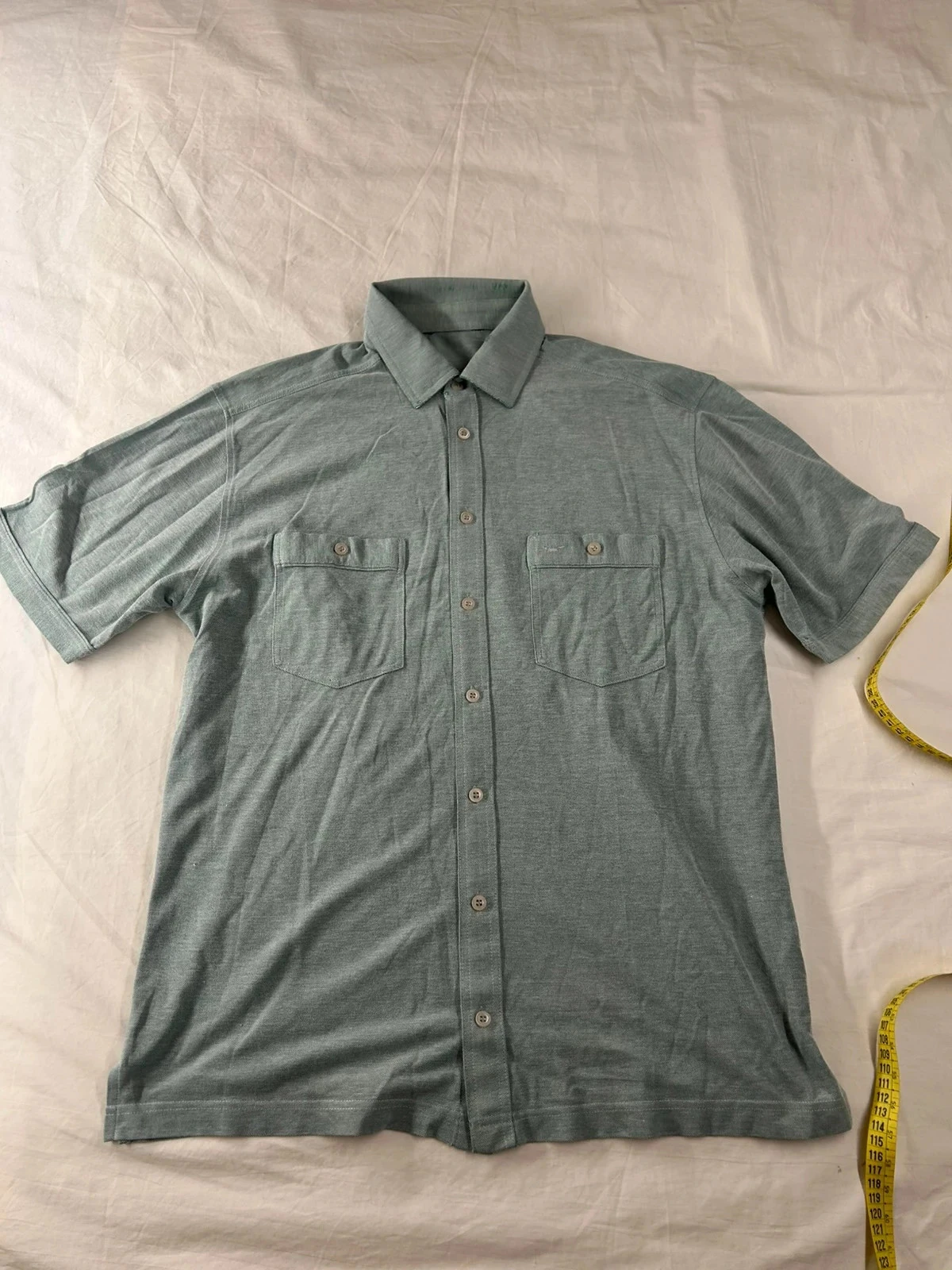 Polo bleu clair vintage taille L